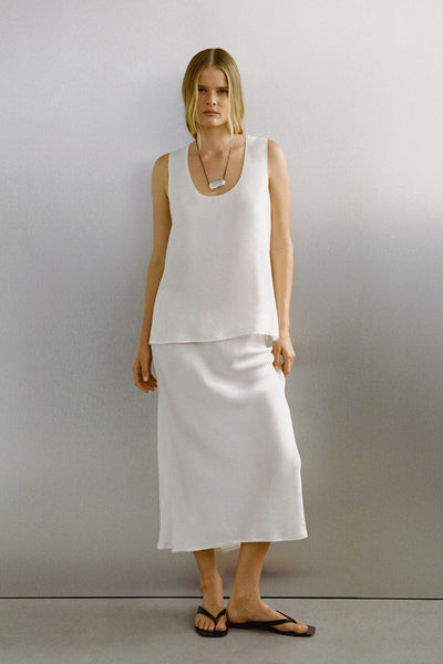Zoe wearing ARELIA WHITE CUPRO MIDI SKIRT