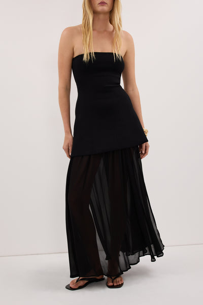 Zoe wearing CORALIE BLACK SHEER MIDI SKIRT