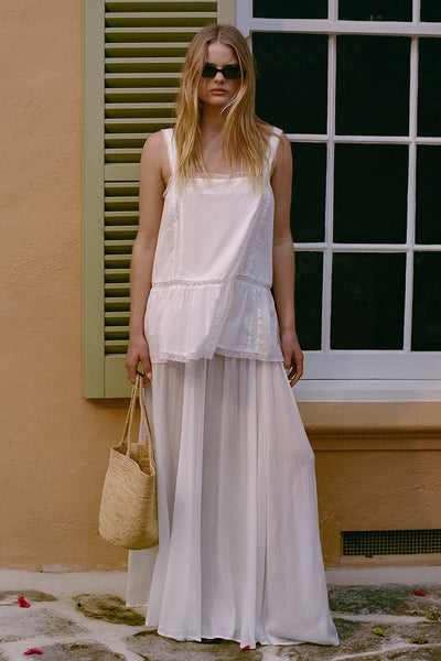 Zoe wearing CORALIE OFF WHITE SHEER MIDI SKIRT