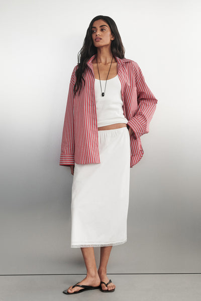Anaya wearing ROSIN WHITE KNEE LENGTH SKIRT