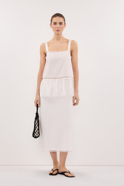Stas wearing ROSIN WHITE KNEE LENGTH SKIRT