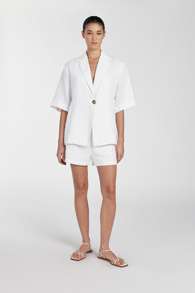 Aude wearing CORY WHITE LINEN SHORT