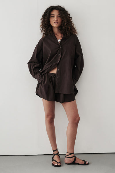 Carol wearing RHEA BURNT CHOC COTTON DRAWSTRING SHORT