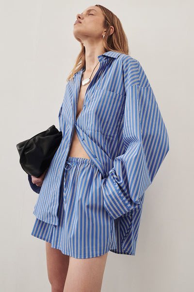 Zoe wearing MISHA AZURE BLUE STRIPE SHORT