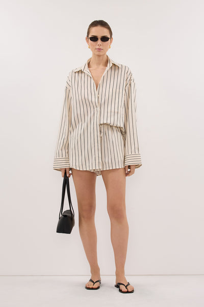 Stas wearing FABLE CREAM SILK BLEND SHORT