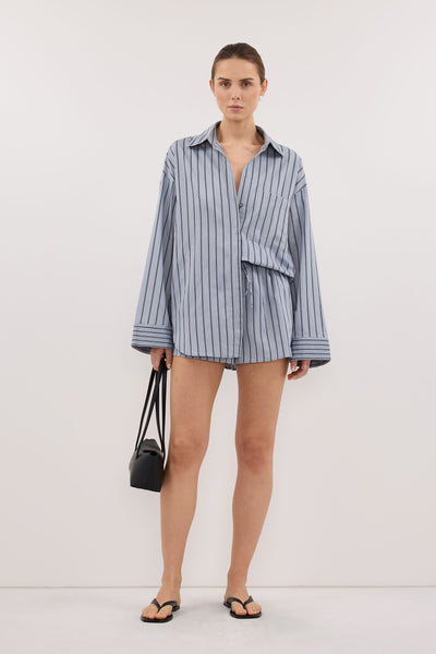 Stas wearing FABLE DUSTY BLUE SILK BLEND SHORT