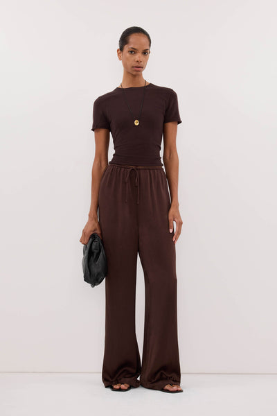 Kristen wearing MYA BITTER CHOC SATIN PANT