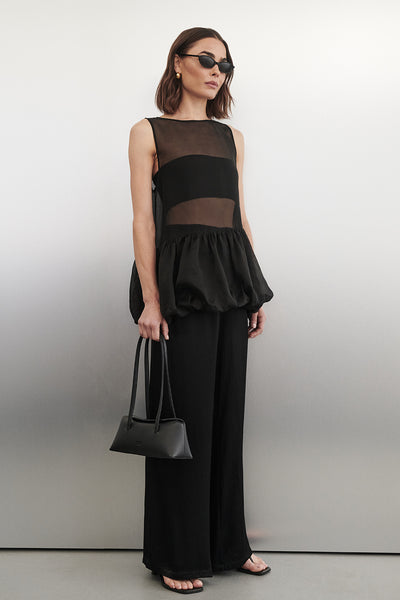 Bambi wearing MYA BLACK SATIN PANT