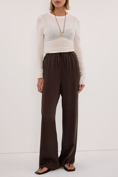 Joanna wearing PERCY BITTER CHOC SILK PANT