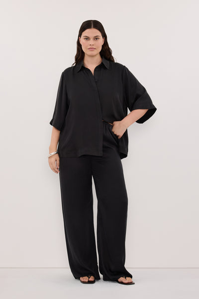 Jasmine wearing PERCY BLACK SILK PANT