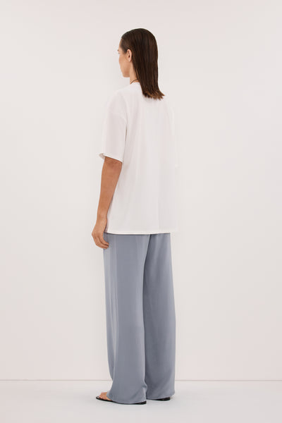 Stas wearing PERCY DUSTY BLUE SILK PANT