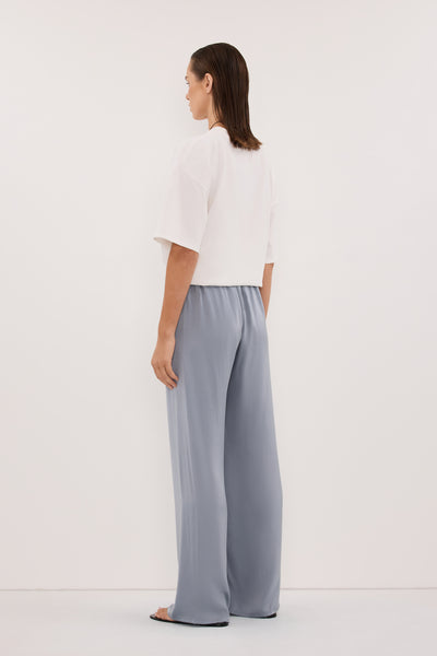 Stas wearing PERCY DUSTY BLUE SILK PANT