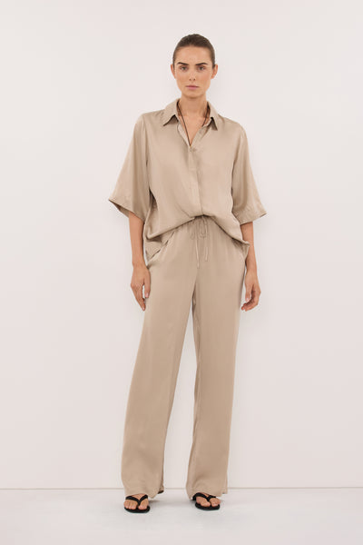 Stas wearing PERCY GOLD SILK PANT