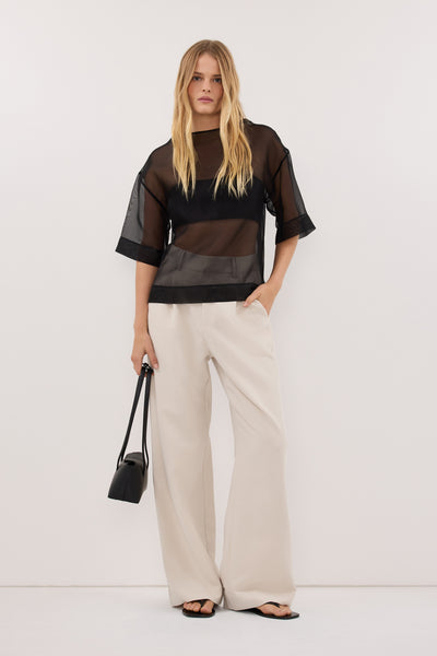 Zoe wearing ELLE BONE PANT