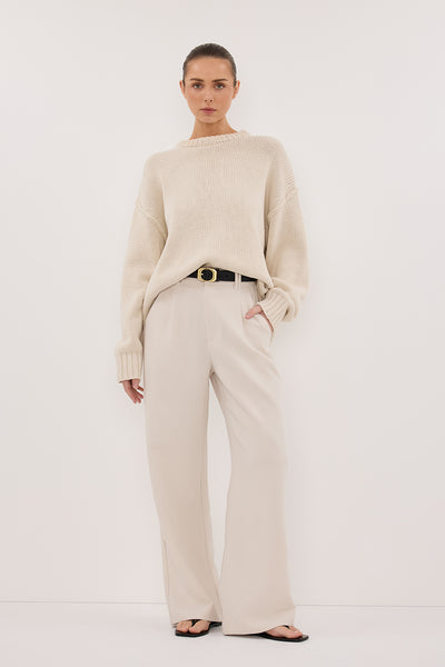 Stas wearing ELLE BONE PANT