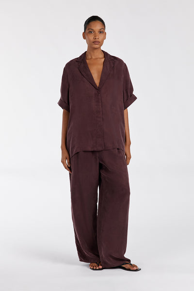 Eduarda wearing LIAM CURRANT CUPRO PANT