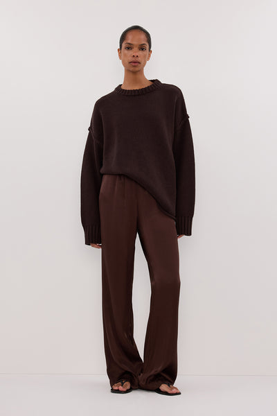 Kristen wearing MONICA BITTER CHOC SATIN PANT