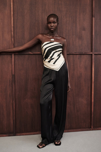 Ajok wearing MONICA BLACK SATIN PANT