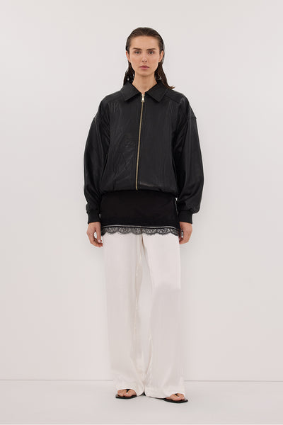 Stas wearing MONICA WHITE SATIN PANT