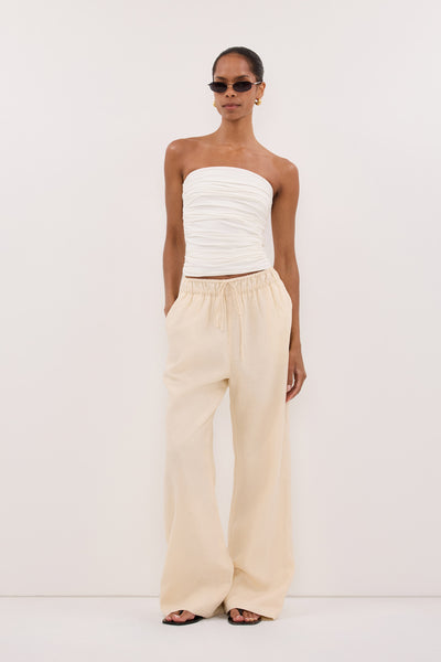 Kristen wearing NOA SANDSTONE LINEN PANTS