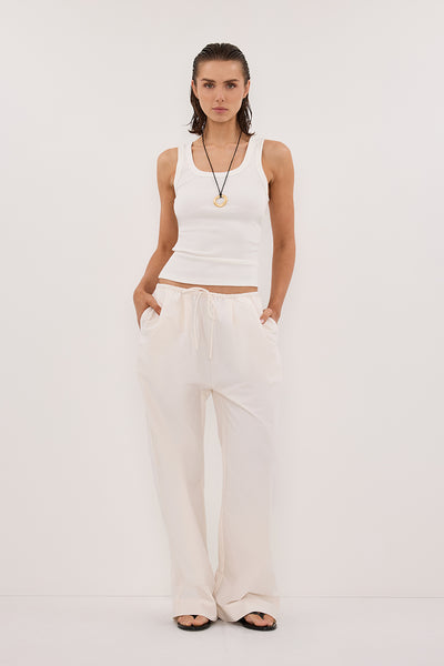 Stas wearing RHEA CREAM COTTON DRAWSTRING PANT