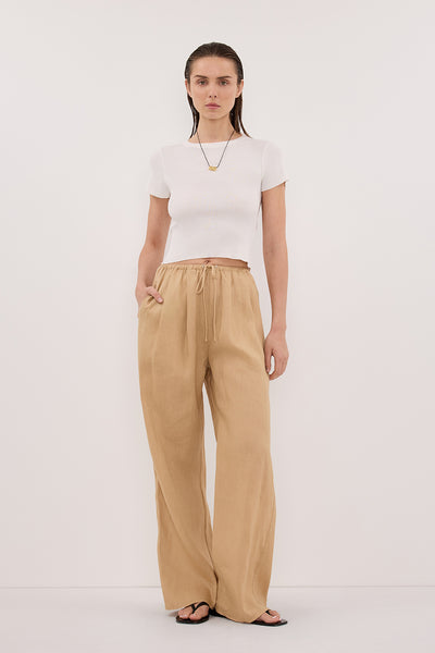 Stas wearing LUNE TAN LINEN PANT