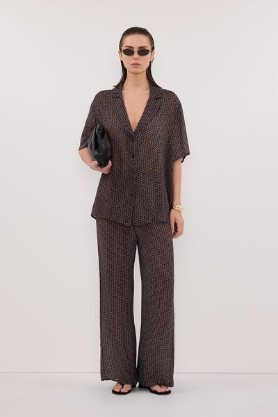 Stas wearing TIA CHOC MICRO CHECK PANT