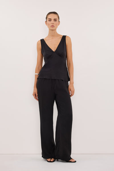 Stas wearing PIPPA BLACK SILK PANT