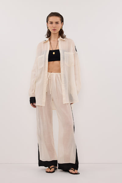 Carol wearing VIVIANNA SANDSTONE RAMIE PANT