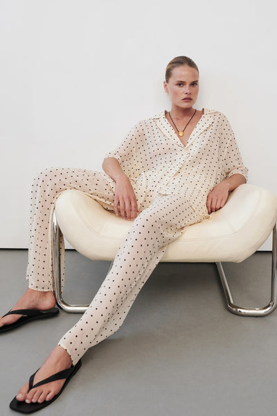 Zoe wearing VANESSA SANDSTONE SPOT PANT