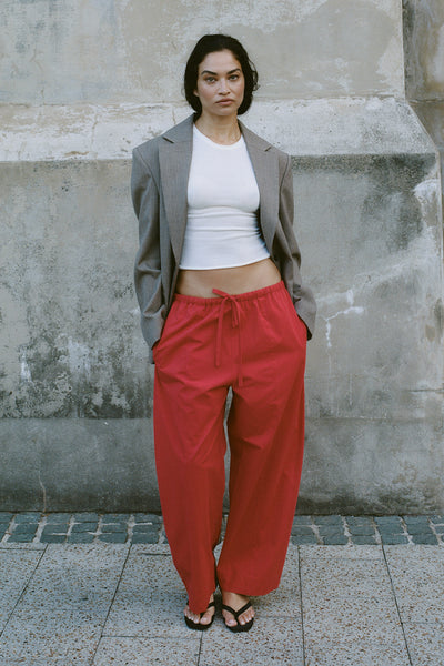 Shanina wearing SCOUT RED COTTON BARREL LEG PANT - PRE ORDER