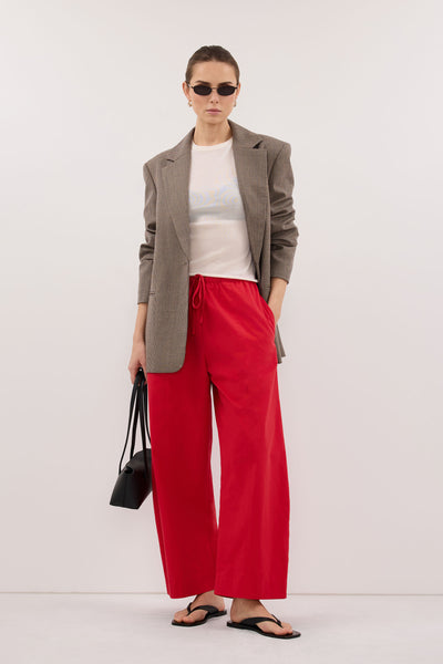 Stas wearing SCOUT RED COTTON BARREL LEG PANT