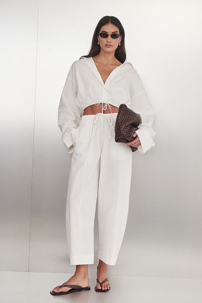 Holly wearing SCOUT WHITE COTTON BARREL LEG PANT
