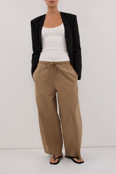 Aude wearing SCOUT WHEAT COTTON BARREL LEG PANT