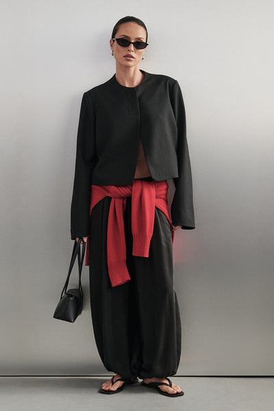 Casey wearing FRANCIS BLACK CUPRO BALLOON PANT