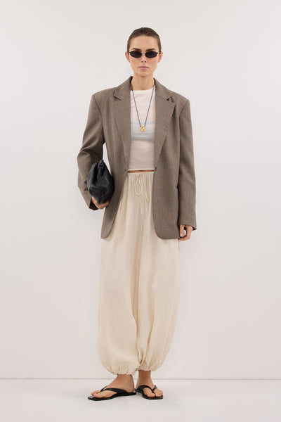 Stas wearing FRANCIS SANDSTONE CUPRO BALLOON PANT
