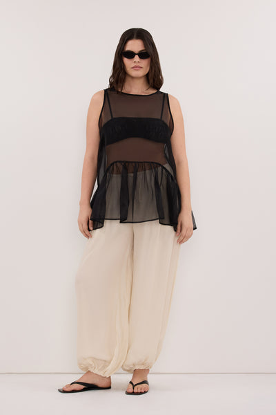Jasmine wearing FRANCIS SANDSTONE CUPRO BALLOON PANT
