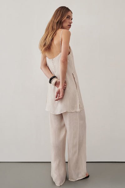 Zoe wearing AMARA CREAM STRIPE CUPRO PANT