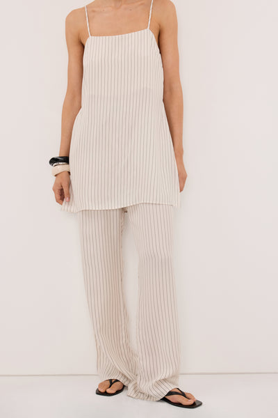 Joanna wearing AMARA CREAM STRIPE CUPRO PANT