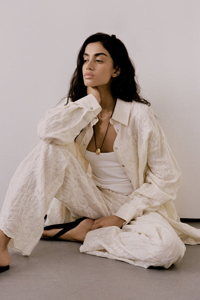 Anaya wearing CORDELIA SANDSTONE RAMIE PANT