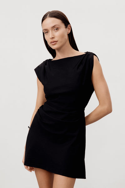 Casey wearing MARMO BLACK DRAPED MINI DRESS