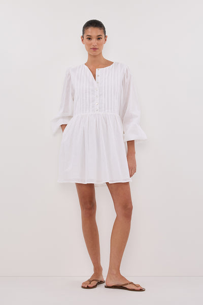 Aude wearing LARS WHITE BUTTON LONG SLEEVE LINEN MINI DRESS