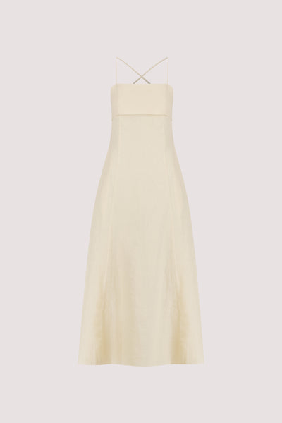 Aude wearing DANIELLA STRAW LINEN TIE BACK MIDI DRESS