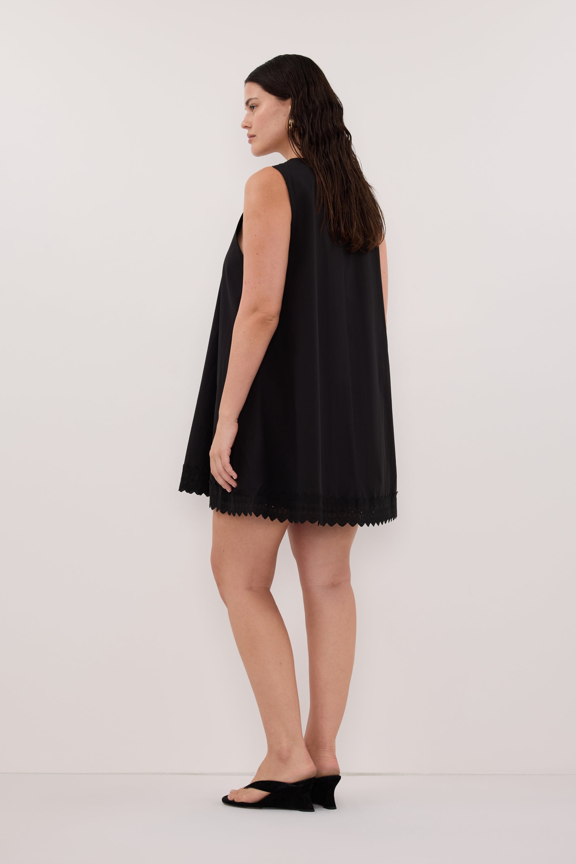 Annabel Sleeveless V Neck Mini Dress in Black By DISSH Annabel Sleeveless V Neck Mini Dress in Black By DISSH