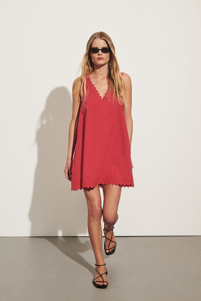 Zoe wearing ANNABEL RED SLEEVELESS V NECK MINI DRESS