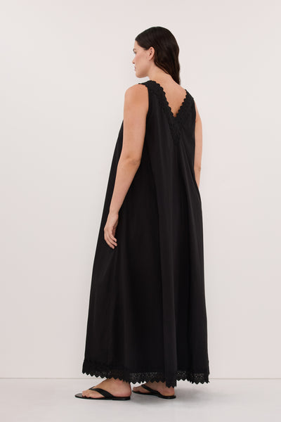 Stas wearing ANNABEL BLACK SLEEVELESS V NECK MIDI DRESS