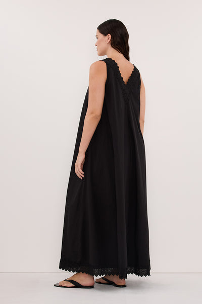 Jasmine wearing ANNABEL BLACK SLEEVELESS V NECK MIDI DRESS