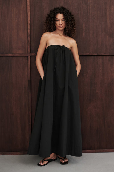Carol wearing SOMMER BLACK STRAPLESS POPLIN MIDI DRESS