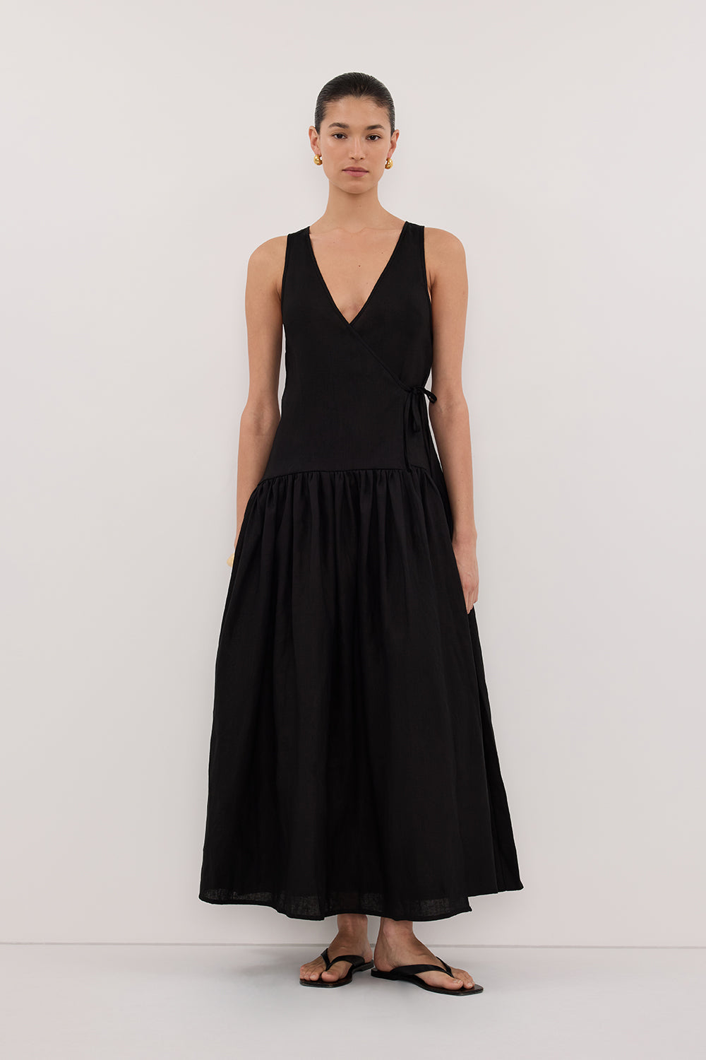 Ilio Sleeveless Linen Wrap Midi Dress in Black By DISSH