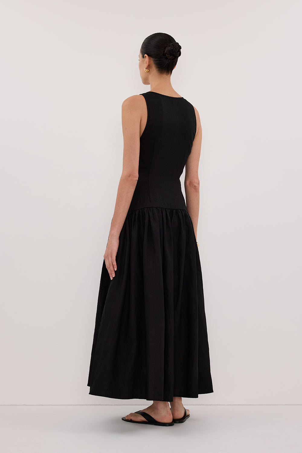 Ilio Sleeveless Linen Wrap Midi Dress in Black By DISSH Ilio Sleeveless Linen Wrap Midi Dress in Black By DISSH